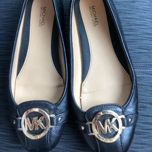 Michael Kors flats size 7.